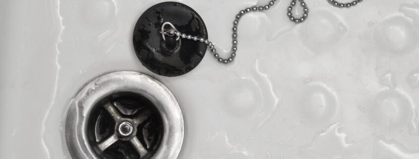 smell shower drain. image of a shower drain and plug.